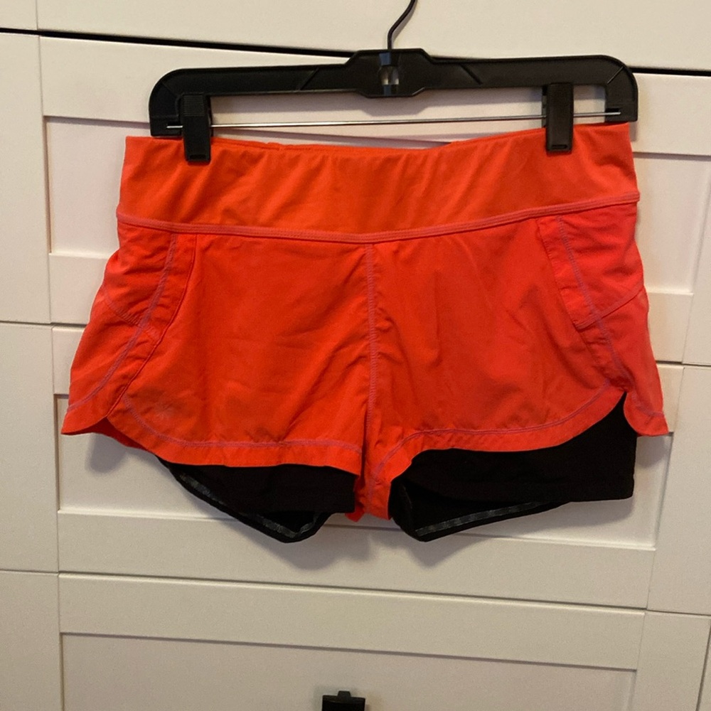 Athleta shorts with built in tights. Reflective zipper beautiful coral color